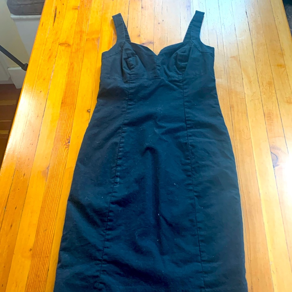 Have body con little black dress